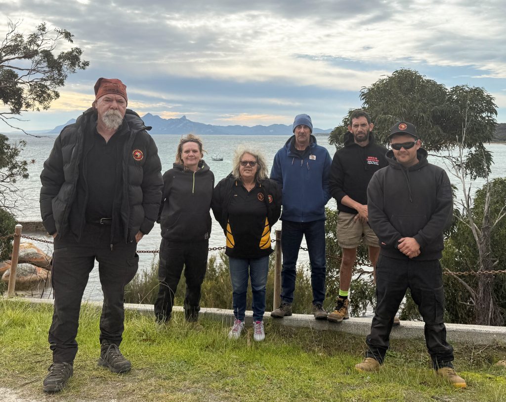 A photo of six rangers on Truwana/Cape Barren Island.
